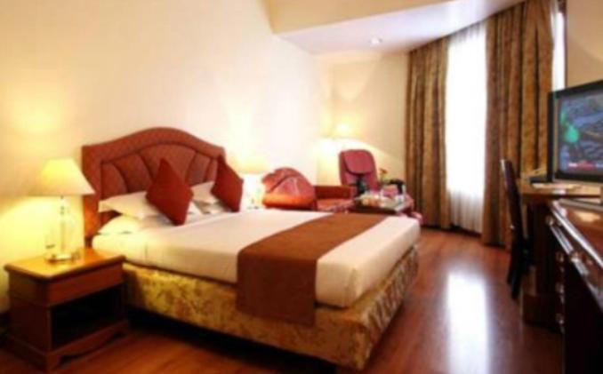 Hotel The Capitol Bangalore Habitación foto